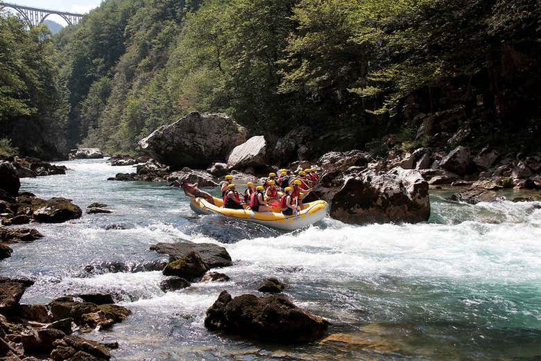 Enjoying paddling through the rapids
