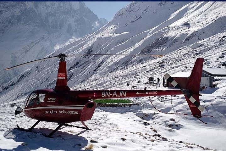 A helicopter in the snowy Himalayas