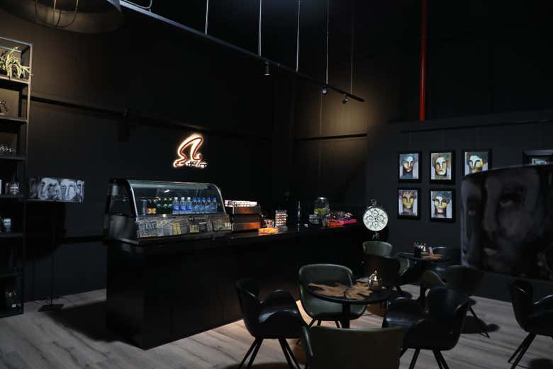 Take a coffee break in between gallery rooms