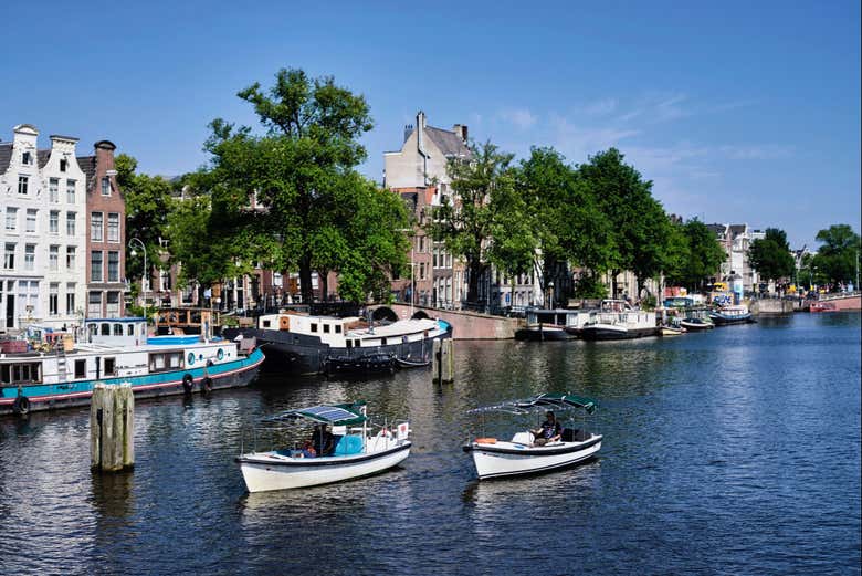 Admire the charms of Amsterdam from the water