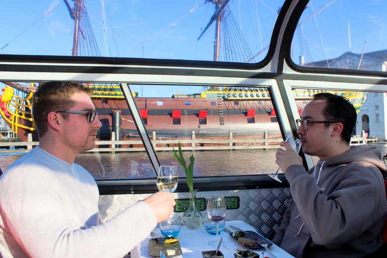 Enjoy wine while cruising down Amsterdam's canals