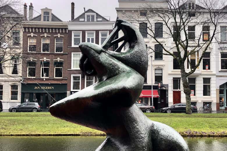 Admiring the different sculptures in Rotterdam
