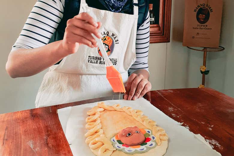 Preparando a guagua de pão para assar