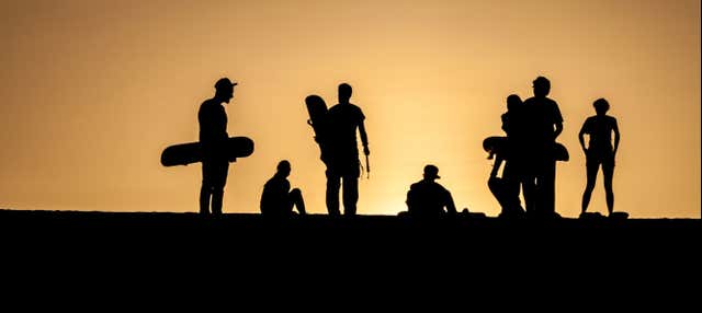 Sandboarding nel deserto di Ica al tramonto