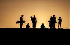 Sandboard no deserto de Ica ao entardecer