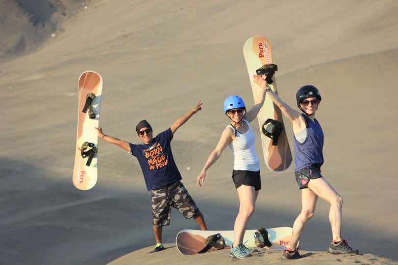 A group going sandboarding