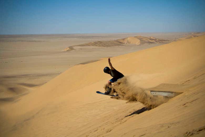 Practicando sandboarding