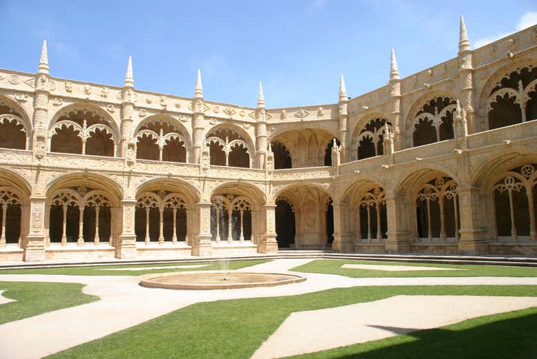 Look at the cloister's Manueline-style courtyard