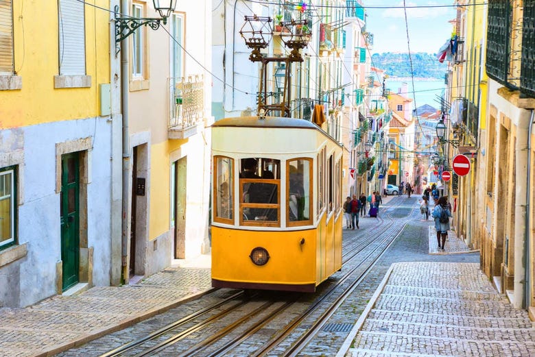 The funicular tram climbing up hilly Bica in Lisbon