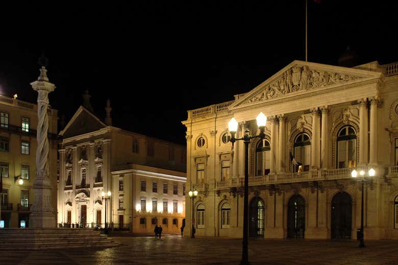 Admire the elegant facade of Lisbon's City Hall lit up at night