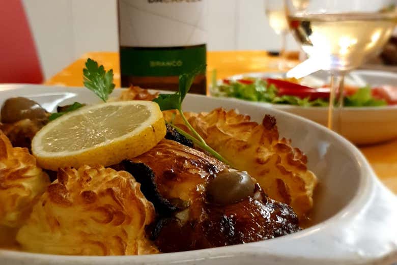 Codfish accompanied by Vinhno Verde wine