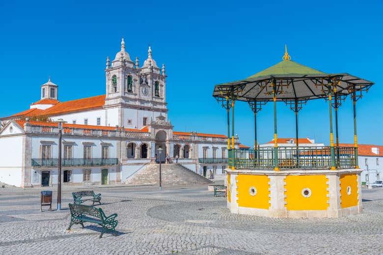 Stroll through the hilltop square of the Sítio in Nazaré