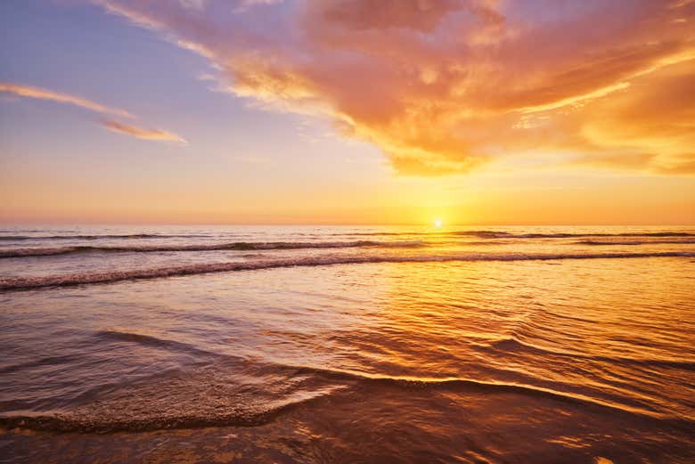 Admire the sunset at the beach