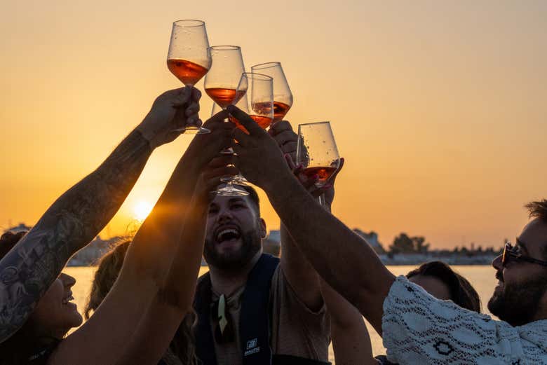 Raise a glass while the golden hour lights up the river