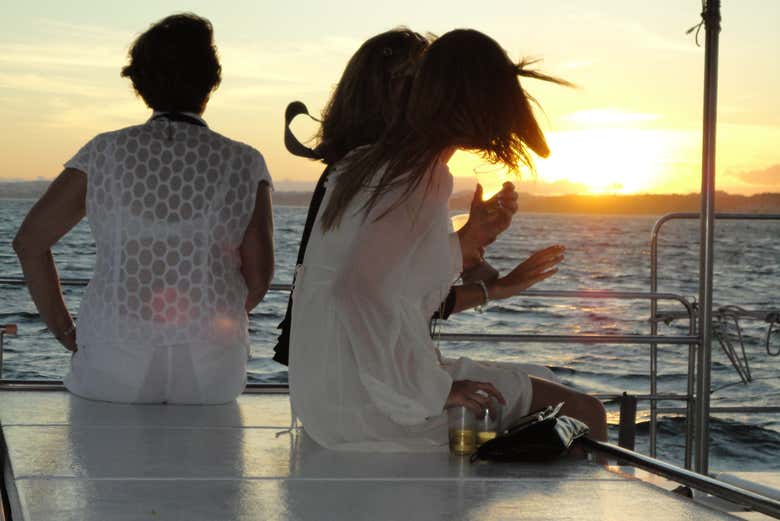 Watch the sunset from a boat