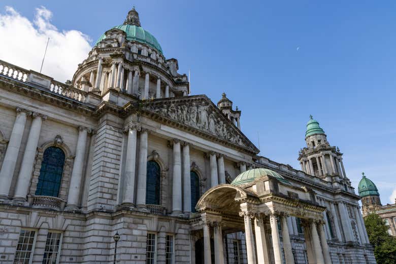 Pass by the stunning Belfast City Hall