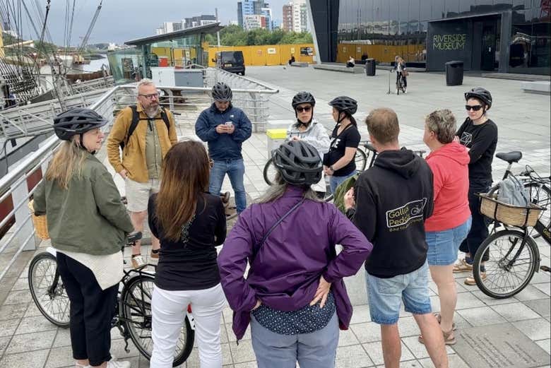 Glasgow Bike Tour guests taking a break to learn about the River