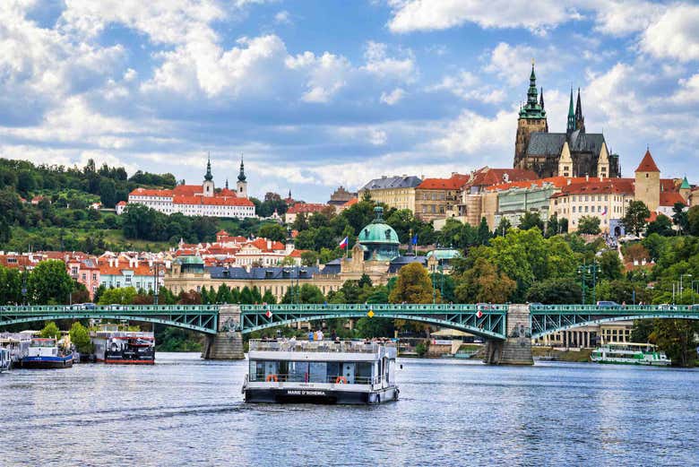 Sail on the Vltava River while seeing the Prague Castle