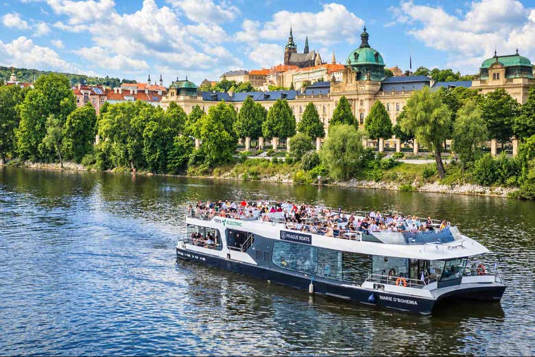 Admire the architectural beauty of Prague from the water