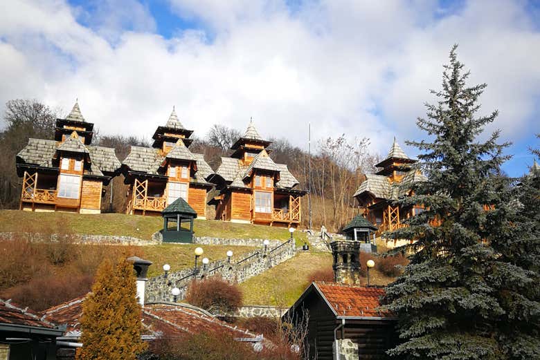 Admire lush valleys surrounded by traditional wooden houses