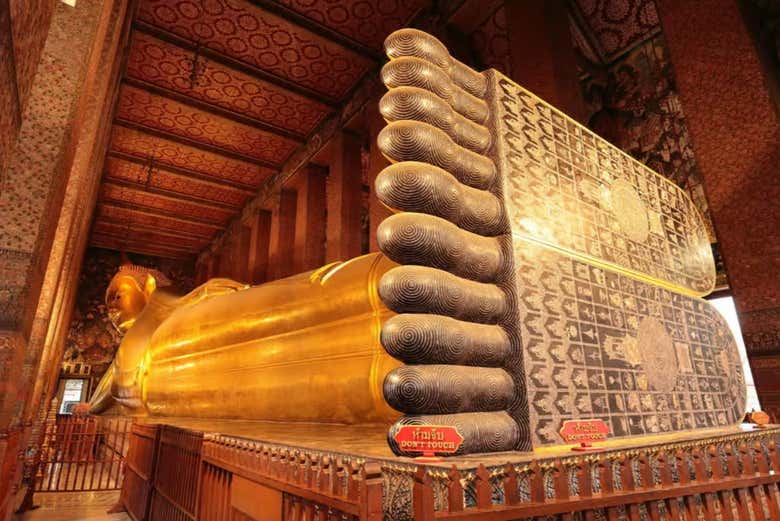 Marvel at the massive Reclining Buddha at Wat Pho