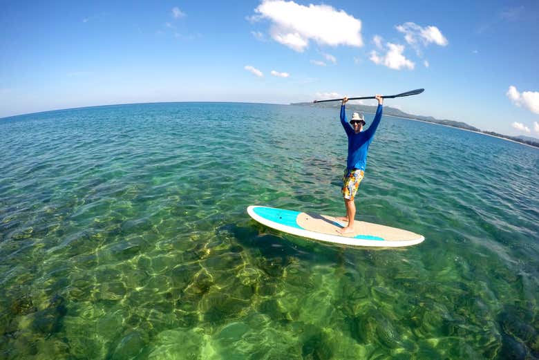 Paddleboard along the turquoise waters