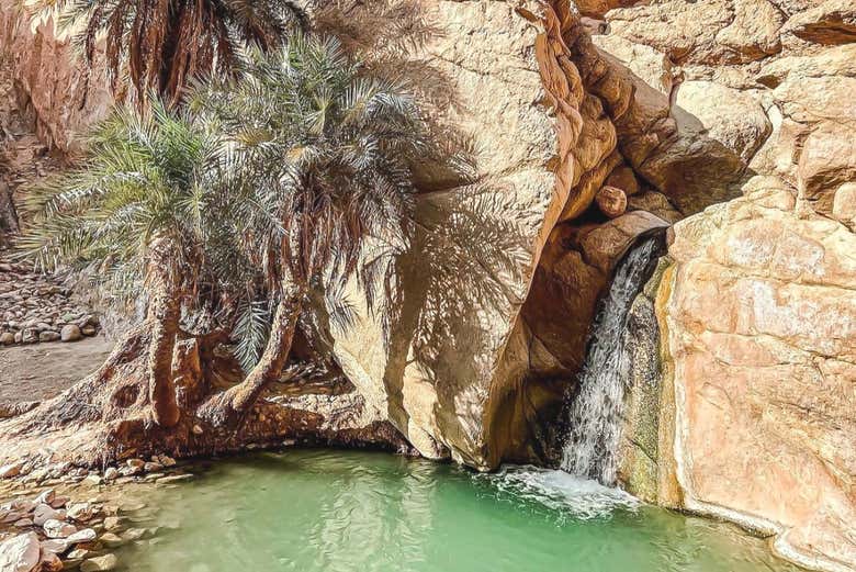 Cool off under the refreshing waterfall in Chebika